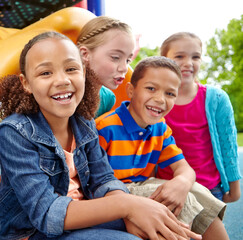 Children, slide and park playground for friends, playing group and portrait for diversity. Kids, happiness and outside games for development at school academy, students break and bonding together