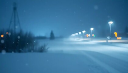 Obraz premium Snowy Night Road Scene with Blurry Lights