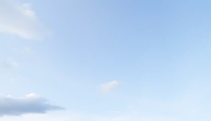 Obraz premium A Light Blue Sky With Sparse White Clouds