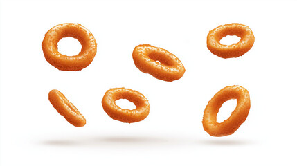 realistic crispy onion rings flying isolated on white background