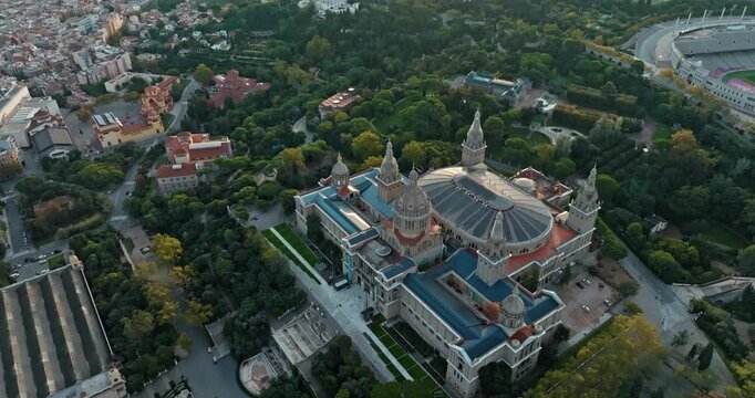 Aerial view aerial National Museum of Art of Catalonia, Barcelona. Historical building architecture of tourist points in the cityscape of the Catalan city in Spain. High quality 4k footage