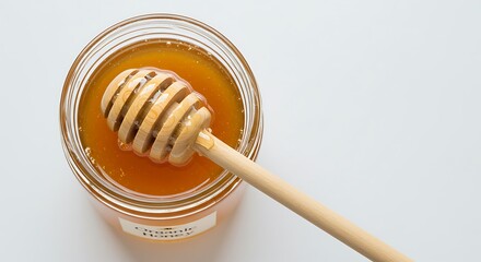 Organic Honey in Glass Jar with Wooden Honey Dipper