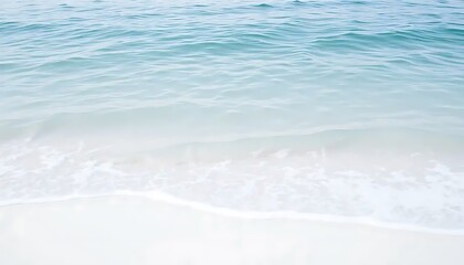 Obraz premium Gentle ocean waves lapping a pristine white sandy beach