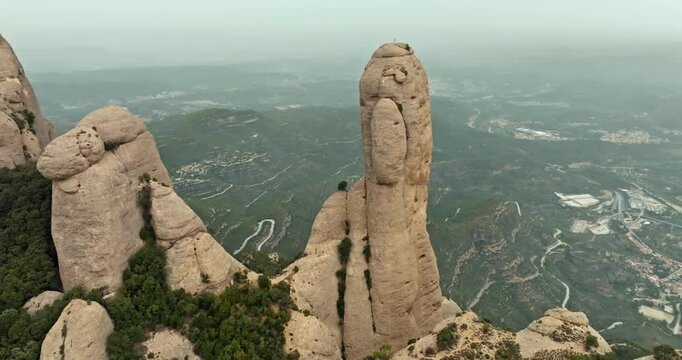 Aerial landscape view of Montserrat mountain in Catalonia. Beautiful mountain peaks and ridges in Spain. High quality 4k footage