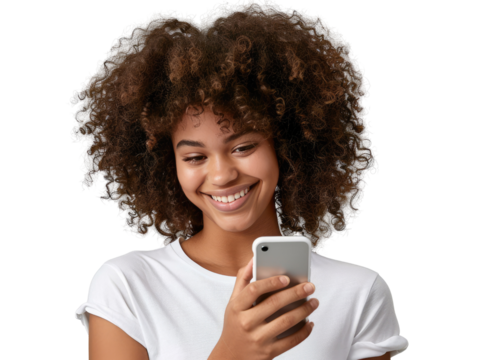 A portrait of a young African American black woman with curly hair looking at her mobile phone and smiling, isolated in a transparent background. Cut out or PNG.