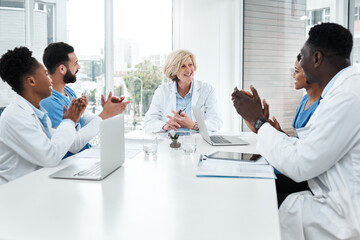 Meeting, applause and group of doctors in office with planning, professional success and medical...