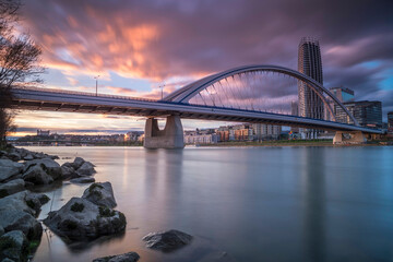 Bratislava city at sunset, bridge Apollo over the Danube river