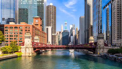 Chicago, Illinois skyline in front of the Lasalle street bridge. Chicago is the most populous city...