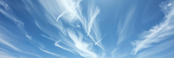 Ethereal cirrus clouds drifting across the sky, dreamy landscape, wispy clouds, feathery clouds