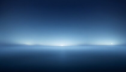 Fototapeta premium A serene, gradient blue landscape with soft light fading into the horizon, evoking a calm, tranquil atmosphere.