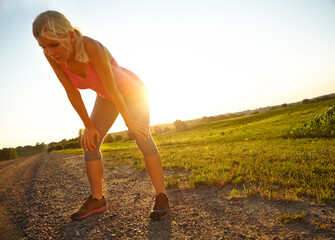 Break, runner and woman with fatigue, exhausted and rest for wellness with exercise, training or...