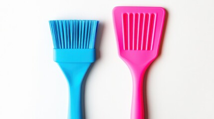 Colorful Kitchen Utensils with Blue Pastry Brush and Pink Spatula on Light Background for Culinary Use