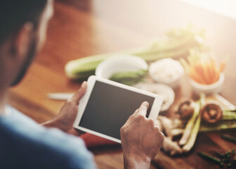 Man, cooking or vegetables with hands on tablet screen for recipe research, ingredients or dinner idea website. Tech, male person or chef browsing internet for mediterranean diet and wellness in home