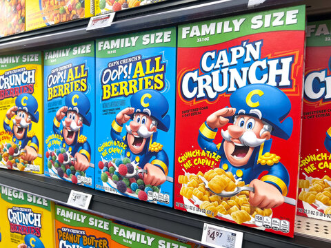 Assorted Carton Boxes of Cap'n Crunch Corn and Oats cereals for sale at a California local supermarket shelf