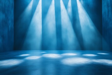 In the studio, a light blue gradient spotlight backdrop sets a sophisticated and professional tone for displaying products or artwork, contributing to a visually striking floor perspective in a blue r
