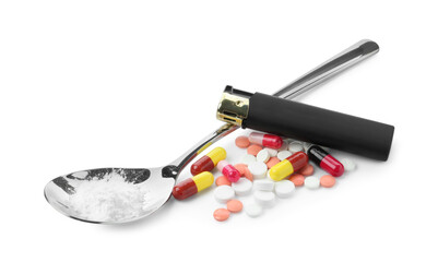 Drug addiction. Different pills, spoon with powder and cigarette lighter isolated on white