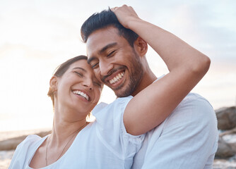 Obraz premium Couple, hug and smile with love, beach and memory with adventure, happy or bonding on vacation in summer. People, man and woman for connection, care and eyes closed on holiday by ocean in Indonesia