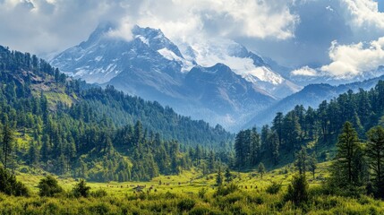 Fototapeta premium 73.A serene and spiritual landscape of Adi Kailash in Uttarakhand, India, with its snow-covered peaks towering above dense forests and alpine meadows. The mystical mountain, surrounded by untouched