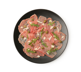 Delicious beef carpaccio with arugula, capers and cheese isolated on white, top view