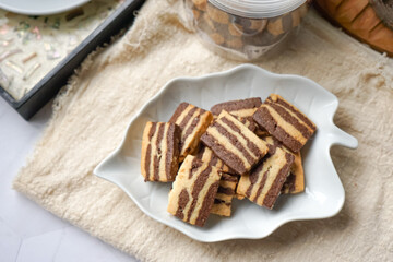 A plate of Striped Butter Cookies atau Biskut Belang.  Butter cookies are popular served during Hari Raya (Eid Mubarak) in Southeast Asia countries.