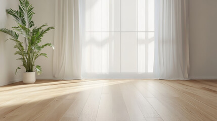 Bright room with wooden floor, large window, and potted plant