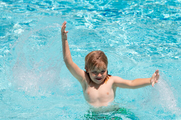 Happy child playing in swimming pool. Summer kids vacation.