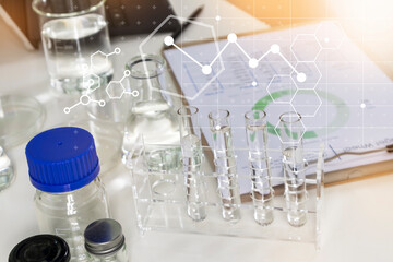 Clear bottles and dishes are used in scientific and medical experiments.