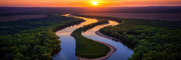 Aerial view, winding river, lush green forest, golden sunset, dramatic sky, oxbow lake, reflective water surface, panoramic landscape, vibrant colors, dense vegetation, natural wonder, bird's eye pers