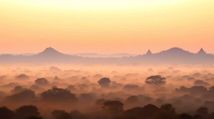 Fototapeta premium Misty Sunrise Over Ancient Temples and Plains