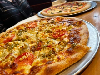Close up of pizzas