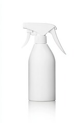 A clear plastic spray bottle against a bright white backdrop. 