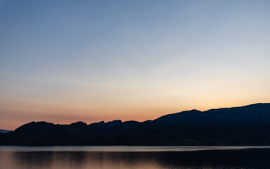 beautiful sunrise scene over a tranquil Okanagan lake British Columbia Canada