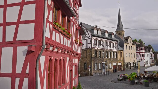 Medieval stone and half timbered buildings in the old town square of Rhens, Rhine River Valley, Germany