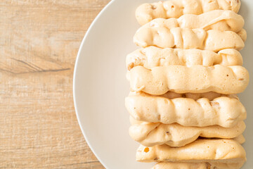 almonds meringue stick on plate
