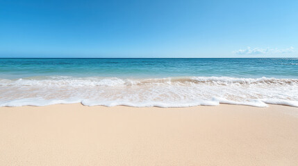 bright sunny beach with gentle waves rolling onto shore