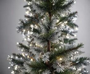 Sparkly silver tinsel covering the branches of a mini Christmas tree, small but mighty, ornamental charm