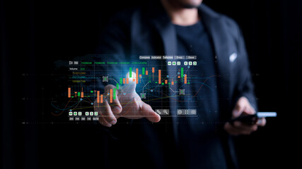 Businessman analyzing forex trading graph financial data. Business finance background.business finance technology and investment concept. Stock Market Investments Funds and Digital Assets.
