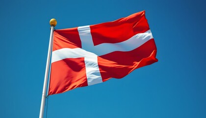 Danish Flag Waving in Blue Sky
