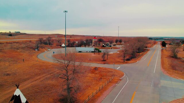 Colorado&rsquo;s rest area featuring teepees, passing trucks, and rolling plains&mdash;an iconic southwestern pitstop for travelers.
