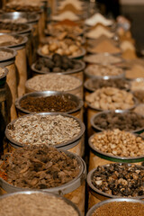 Colorful assortment of dried fruits and nuts displayed at a marketplace showcasing local flavors and healthy snacks