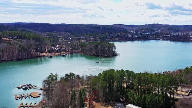 Drone targets pontoon boat on the turquoise blue waters of Lake Kiwi in Seneca, SC.
