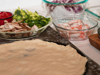 Preparing seafood homemade pizza. close up.