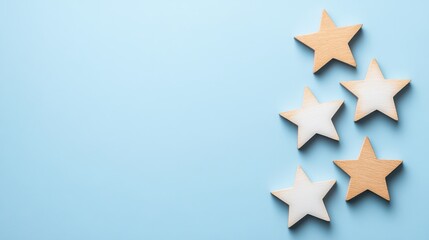Obraz premium Wooden stars on blue background creating a whimsical and playful decoration for various creative projects