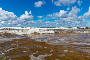 seascape, storm at sea, white waves crashing against the shore, Baltic Sea coast, Latvia