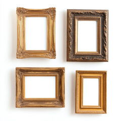 Collection of empty ornate picture frames in varied antique styles on white background