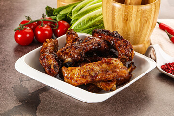 Grilled pork ribs in barbecue sauce