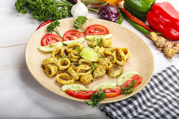 Grilled squid with lime and vegetables