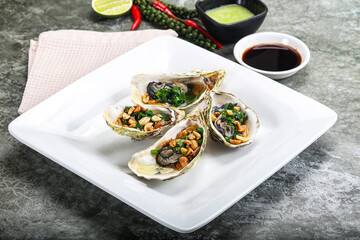 Open half oysters with green onion