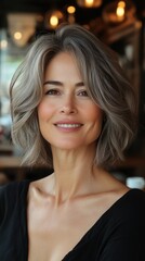 Fototapeta premium Portrait of smiling woman in cozy café setting