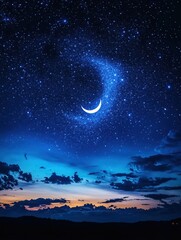 Naklejka premium Crescent moon and starry night sky above dark landscape with clouds at dusk or dawn